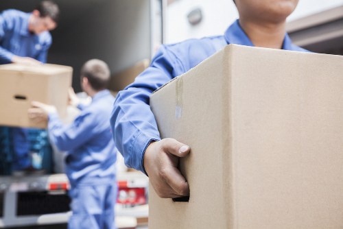Local Hampton removals team preparing a home move with organized packing supplies