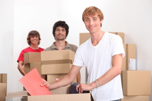 Packed boxes and furniture ready for Hampton removals