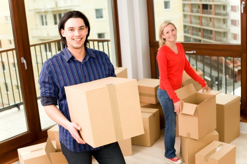 Customer moving items into a Hampton Storage unit during transition